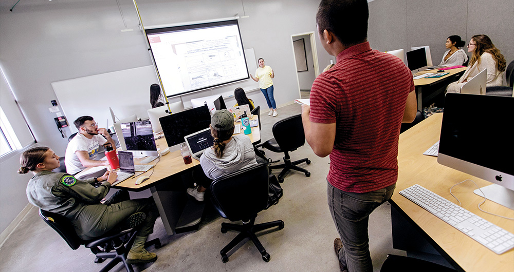 Students in graduate computer lab class