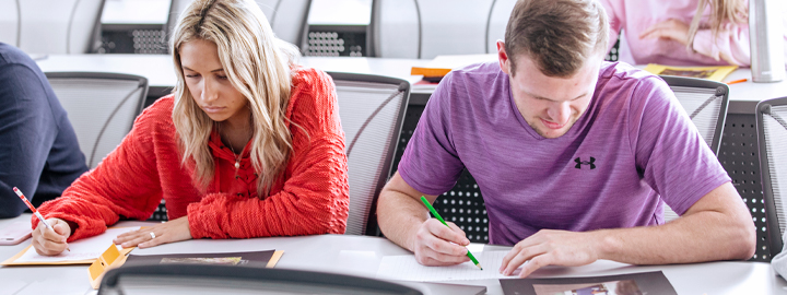 Students studying in a classroom.