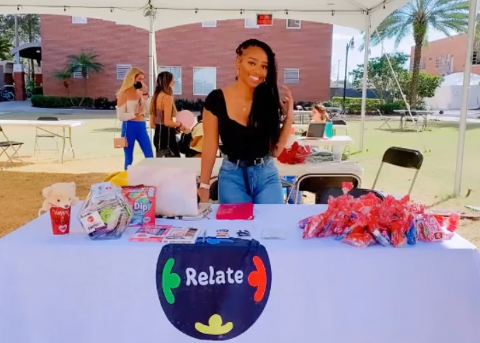 Student at a Relate Tabling Event
