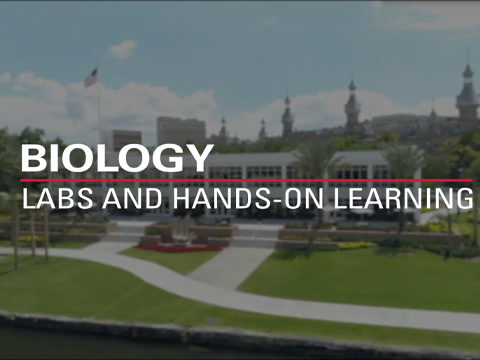 biology lab video with building and river in background