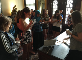 Students writing in Plant Hall