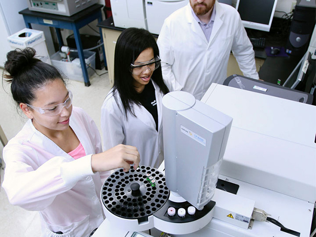 Students using a centrifuge