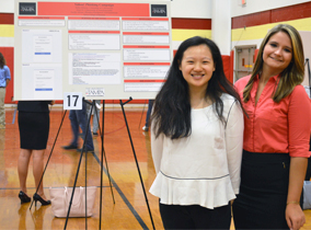 Cybersecurity students present research during research week.