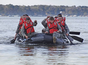 ROTC cadets in an inflatable boat