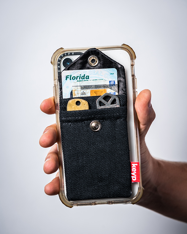 A picture of a pocket that attaches to the back of mobile phones called Keyp.