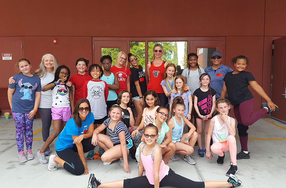 A group of young women from the nonprofit Girls on the Run