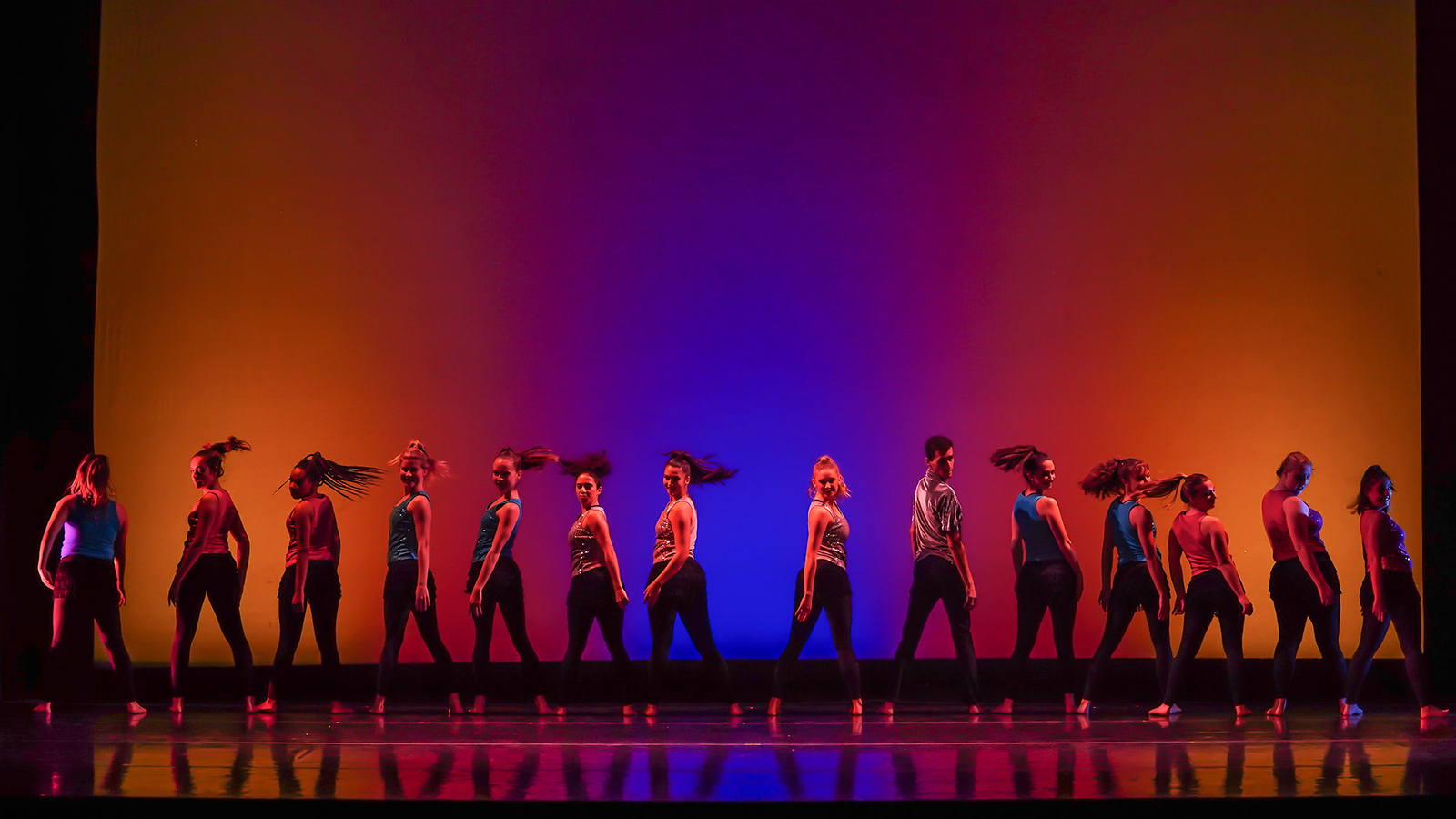 UT dance students on a stage