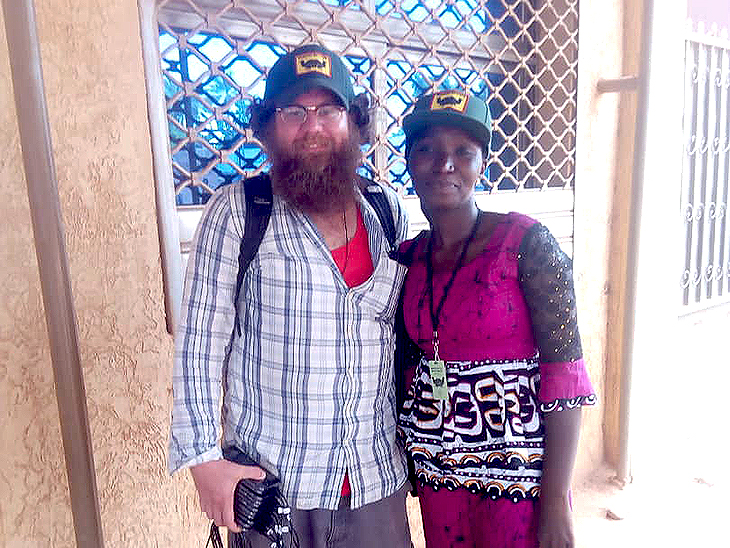 Professor Kevin Fridy and a research assistant in Burkina Faso