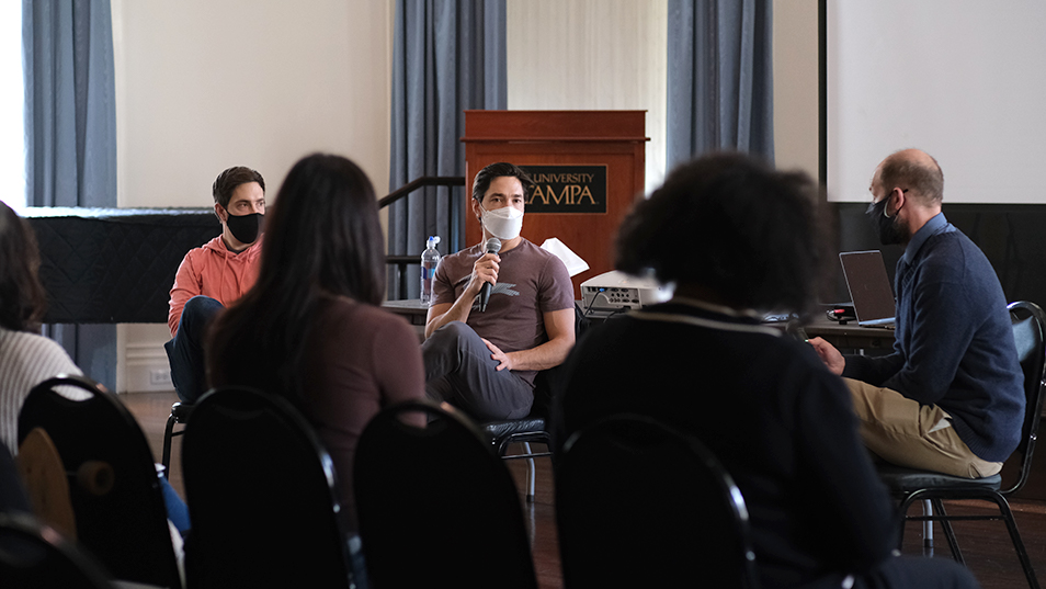 Justin and Christian Long participating in a student workshop on campus.