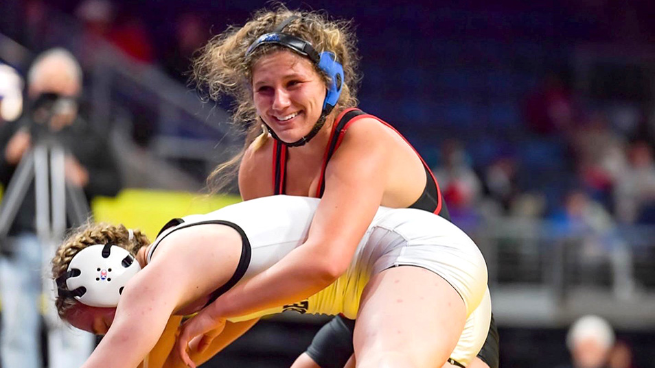 Maggie Palmore wrestling a person